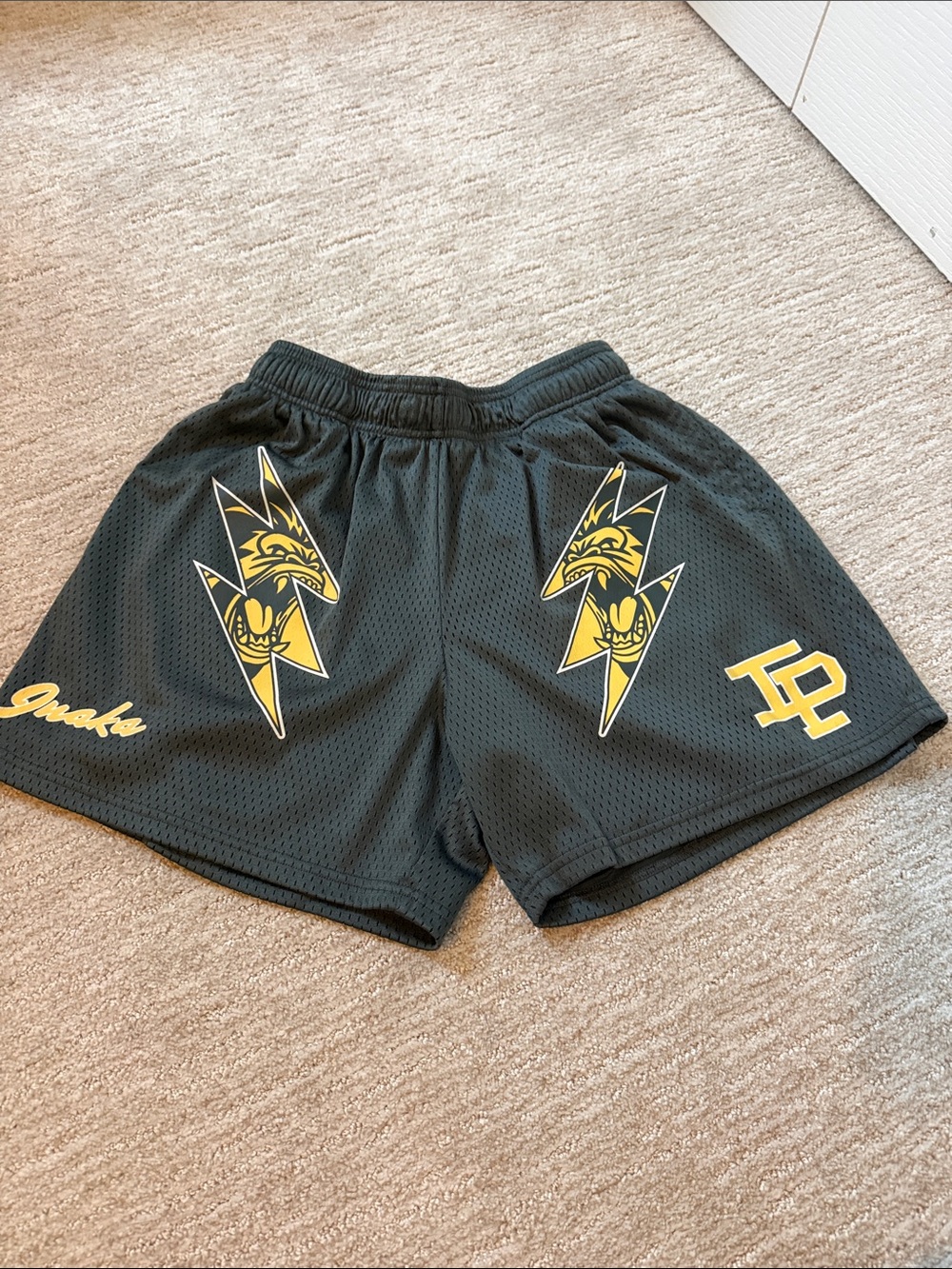Inaka Power Black Athletic Mesh Shorts with Yellow Lightning Graphics